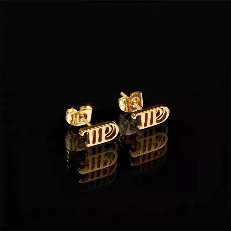 A set of 3, earrings, bracelet, ring